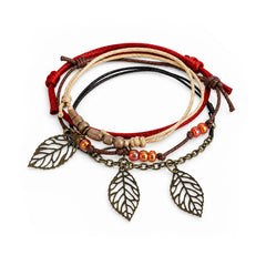Falling Leaves bracelet stack with three bronze-tone leaf charms arranged on a white background
