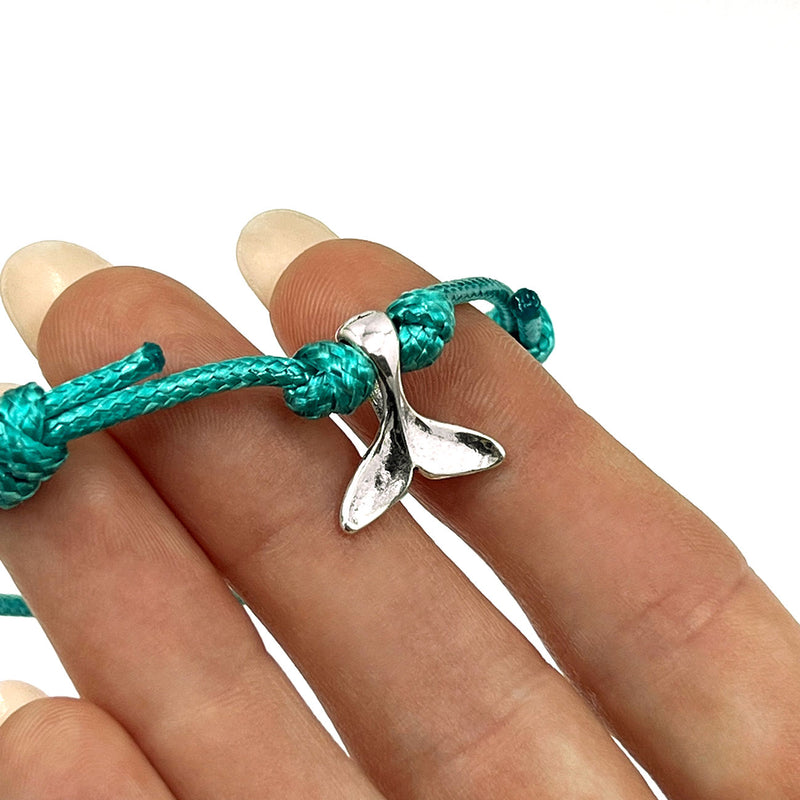 O Yeah Gifts Whale Tail Charm Bracelet – Silver whale tail charm on adjustable turquoise cord, perfect for adding nautical style and ocean vibes to your jewelry collection.