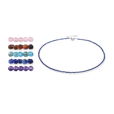 Crystal choker featuring rose quartz, tiger eye, apatite, lapis lazuli and amethyst beads with a delicate, layered crystal necklace design.
