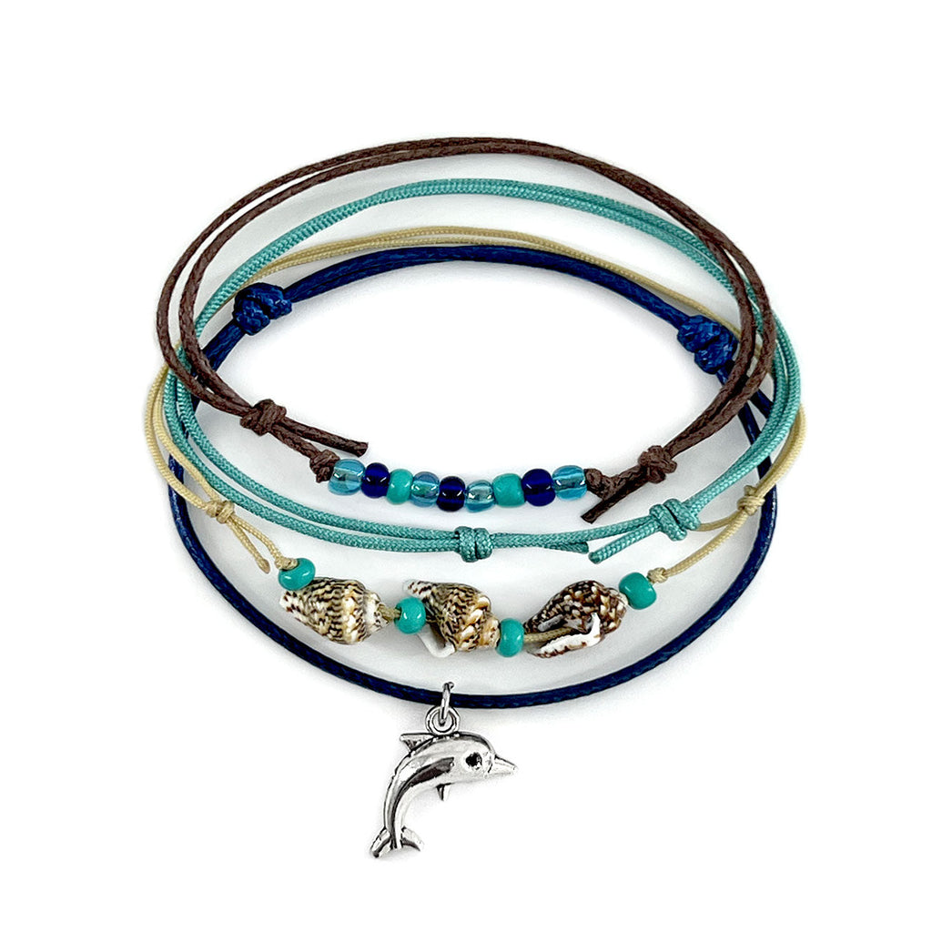Green Dolphin Shell Charm Bracelet Pack with teal cords, glass beads, shell accents and silver dolphin charm
