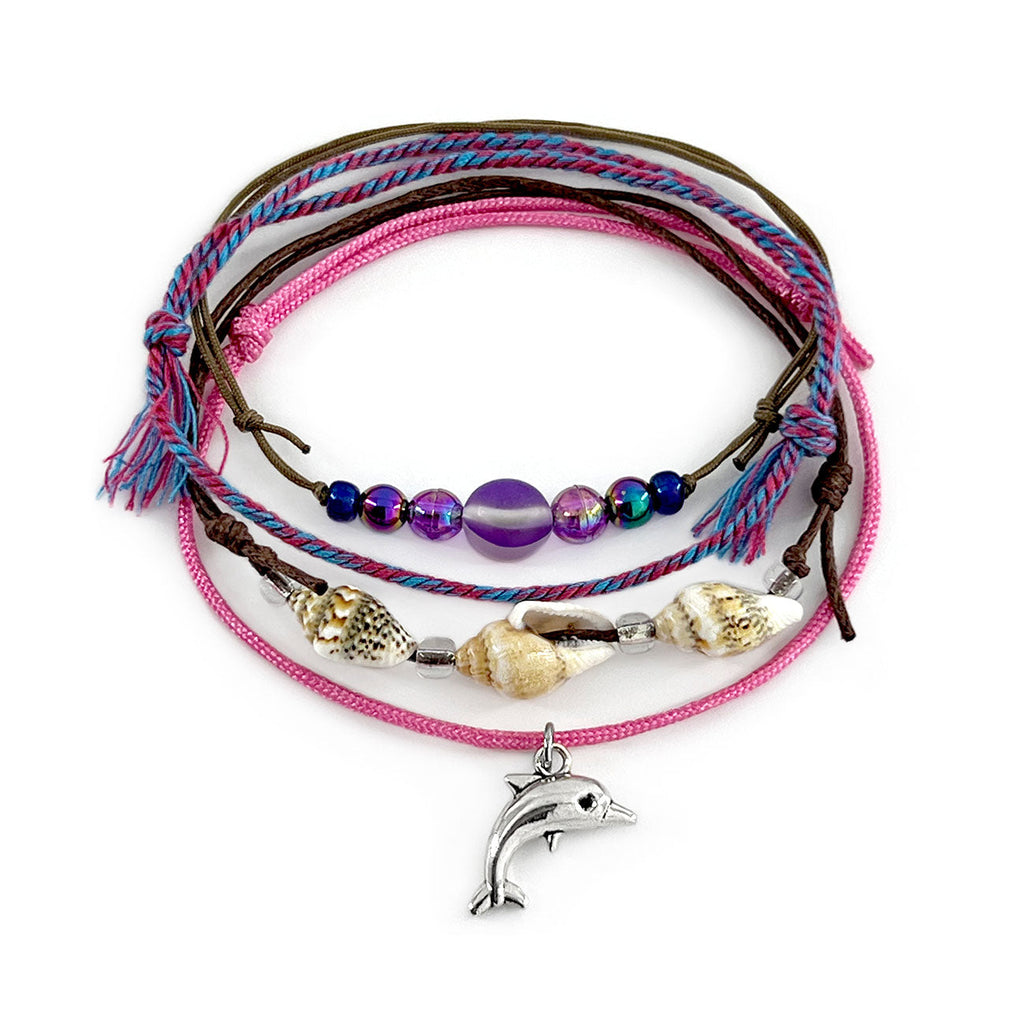 Pink Dolphin Shell Charm Bracelet Pack with braided cords, silver dolphin charm and beachy pink and purple beads