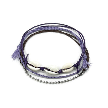 Purple cowrie shell anklet with lavender braided strand, natural cowrie shells and brown cord with ball chain