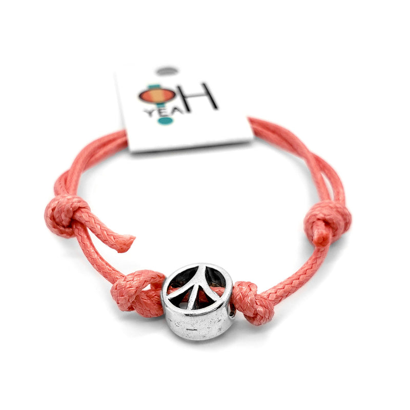 O Yeah Gifts Peace Charm Bracelet – Pink cord bracelet with a peace symbol charm, perfect for adding hippie vibes and colorful style to any outfit.