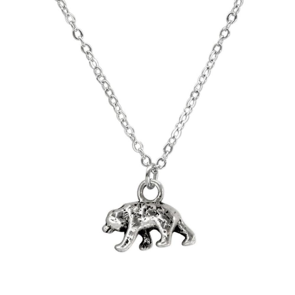 Bear charm necklace – wildlife and nature-inspired bronze jewelry for adventurers and animal lovers.