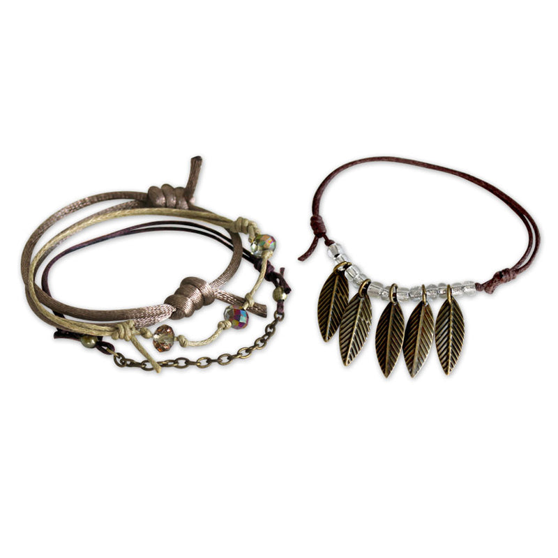Stacked leaf bracelet featuring beads, mixed metals, and nature-inspired textures.