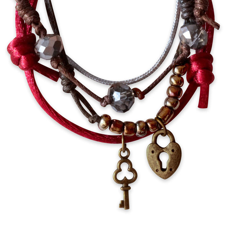 Lock and Key Bracelet worn on wrist – adjustable beach jewelry symbolizing love and friendship.