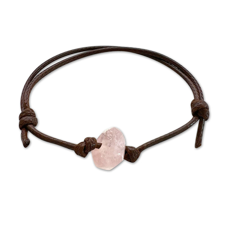 Rose quartz stone bracelet with soft pink beads – symbolizes love and emotional healing.