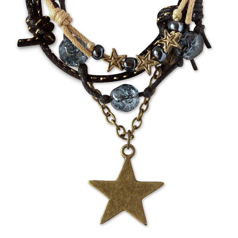 Star Gaze Bracelet stacked with colorful beads and mixed metals for a trendy look.