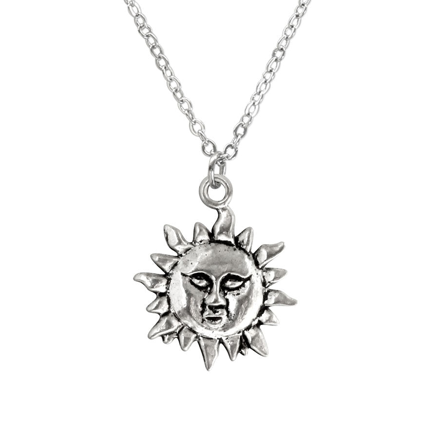 Sun charm necklace with boho beach vibes – radiant jewelry for summer and nature lovers.