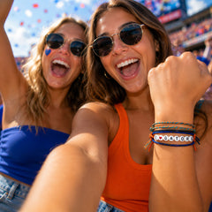 Game-day selfie showing the I Heart Gators bracelet stack on the wrist