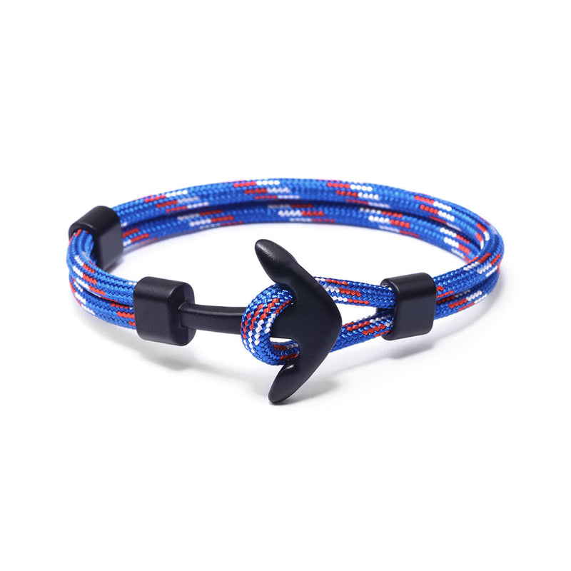Men's blue anchor bracelet with a durable nylon cord featuring red and white accents, paired with a bold 1.5-inch black metal anchor clasp. This nautical-inspired bracelet offers a secure, water-resistant design, ideal for casual, office, or evening wear. Perfect for the modern man seeking a stylish and symbolic accessory.