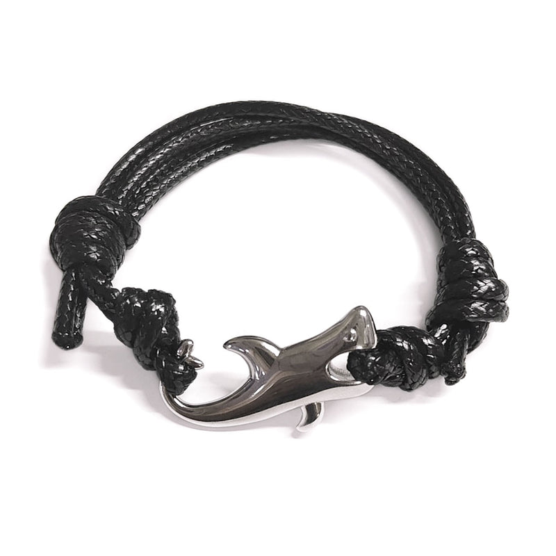 Men’s black nylon cord bracelet featuring a stainless steel shark-shaped clasp, combining durability with playful style. Adjustable to fit wrists sized 4-6 inches, this sleek shark bracelet is perfect for adding a bold touch to both casual and formal attire.