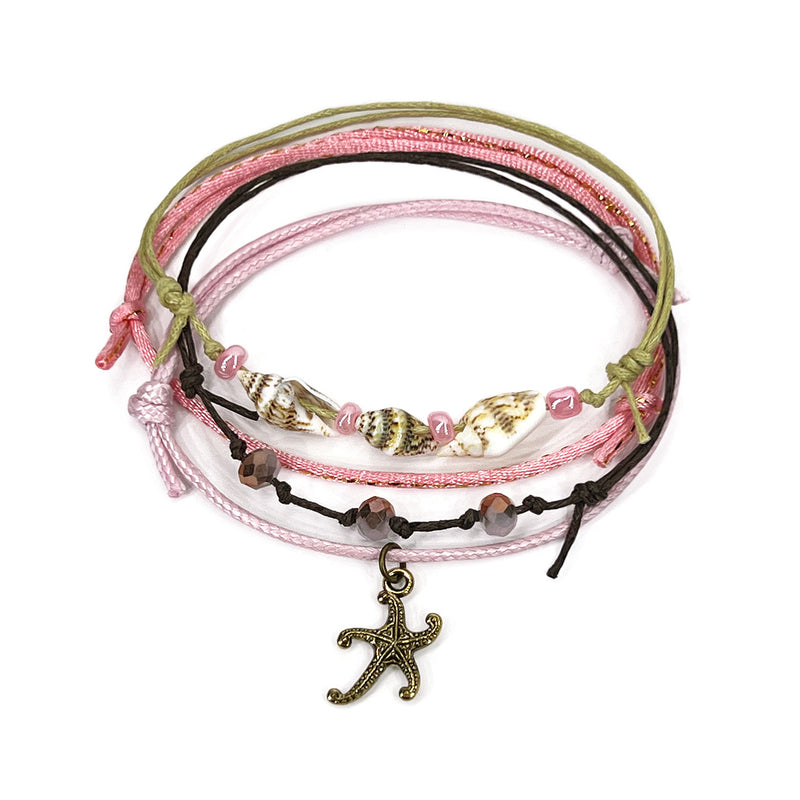 O Yeah Gifts Pink Gold Starfish Bracelet with Shell Beads – A vibrant beach bracelet featuring a gold starfish charm, natural shell beads and bright pink cords. Perfect for besties, friendship bracelets and beach lovers.