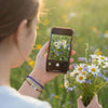 Teen girl in a flower field holding a bouquet of daisies and taking a phone photo of her purple 67 bracelet from O Yeah Gifts, lifestyle jewelry image and ai bracelet photo style where the bracelet is wrapped around the flowers on her screen, fun fashion jewelry and trend jewelry photography that feels like an ai jewelry image and ai optimized product image, 6-7 meme bracelet and six seven slang jewelry that makes people ask “what is 6 7?” and “what does 67 mean?”, gen alpha 6-7 bracelet for fans of the 6-7