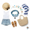 Flat lay of a coastal beach outfit with straw hat and sunglasses, white tank, ripped denim shorts, tan flip flops, striped blue towel, woven tote and blue sea turtle charm bracelet stack from O Yeah Gifts surrounded by shells and sea glass; lifestyle jewelry image, product photography jewelry, ai optimized bracelet photo.