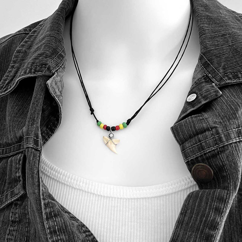 Rasta beaded shark tooth necklace with black adjustable cord, red yellow green surfer-style necklace featuring wire-wrapped tooth pendant