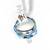 Wave Bracelet Style Pack with 4 adjustable beaded string bracelets featuring sea glass beads and silver wave charm, shown with O Yeah Gifts tag