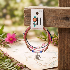 Pink Alligator Bracelet Style Pack on its O Yeah 4 PCS adjustable bracelets card, hung on a wooden trail post