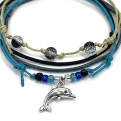 Close-up of the silver-tone dolphin charm with black, blue and clear beads on the Black Dolphin Bracelet Style Pack