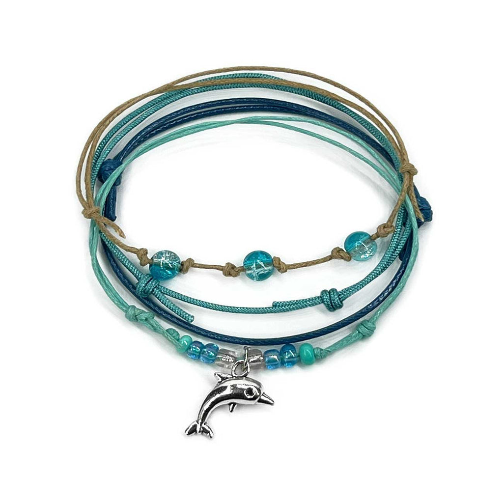 Dolphin Bracelet Style Pack in Green: 4 seafoam, teal, navy and tan bracelets with a silver-tone dolphin charm, on white