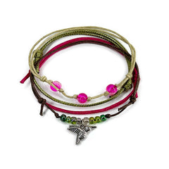 Green hummingbird bracelet stack on white: 4 adjustable string bracelets in green, pink, beige with a silver-tone hummingbird