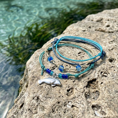 Keep the feeling of Florida springs close with a Manatee Bracelet Style Pack inspired by your favorite warm-water adventures