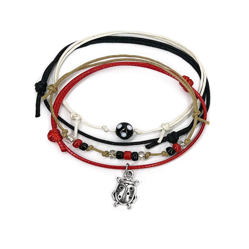 O Yeah Gifts Ladybug Bracelet with silver charm, red and black glass beads, and adjustable cords, perfect for teens and nature-loving BFFs