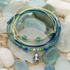 Octopus Bracelet Style Pack hero - four stackable waterproof beach bracelets with a silver octopus charm