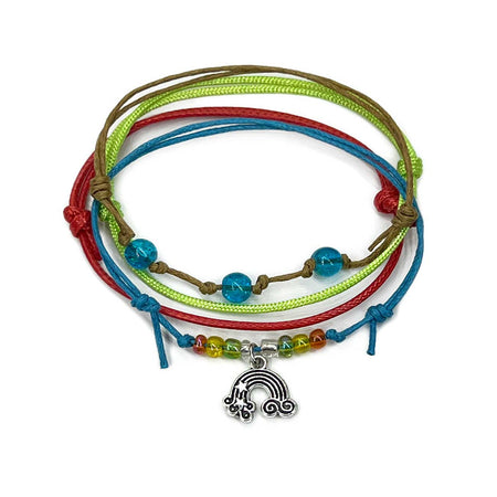 Rainbow Bracelet Style Pack with silver rainbow charm and vibrant nylon cords in red, blue, green and yellow