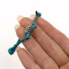 Blue cord shell bracelet featuring a silver shell charm, perfect for beachwear from O Yeah Gifts.