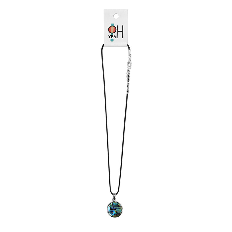 Beach vibe abalone necklace styled with summer accessories and mixed metals.