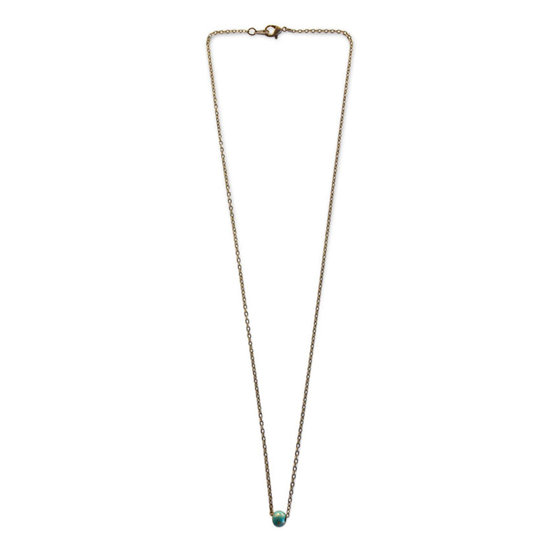 Minimalist beach bead necklace with a single turquoise bead on a bronze chain – ocean-inspired jewelry for beach lovers and boho style.