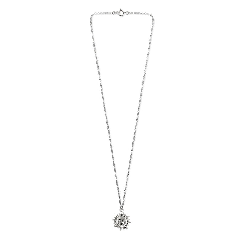 Silver sun charm necklace with boho design – radiant and nature-inspired jewelry for beach and summer lovers.