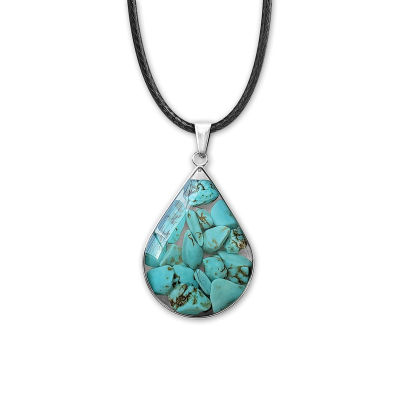Turquoise Crystal Pendant Necklace with a teardrop gemstone on a black cord.