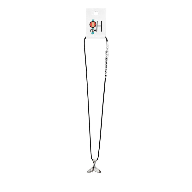 Whale Tail Necklace layered with coastal accessories for a trendy beach look.